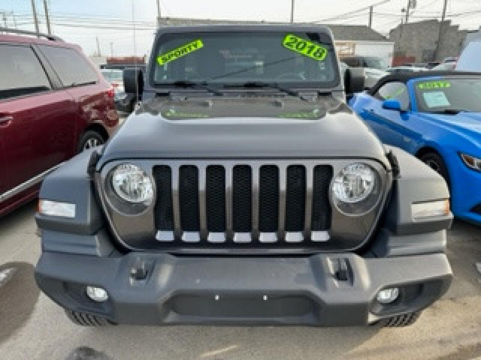2018 SILVER Jeep Wrangler JK Unlimited Sport (1C4HJXDG8JW) with an 3.6L V6 DOHC 24V FFV engine, 6A transmission, located at 3200 1st Avenue North, Billings, MT, 59101, (406) 245-9055, 45.779270, -108.510742 - Super Sharp Jeep Unlimited Sport 4 door Hardtop! Automatic, 6 Cylinder Engine, Air Conditioning, Sport Package, Rear Mounted Spare Tire, Tow Package, One Owner and Much More! CarFax Dealer. Auto Brokers of Montana/AA&A Auto Rental/Fox Car Rental Billings - Photo #0