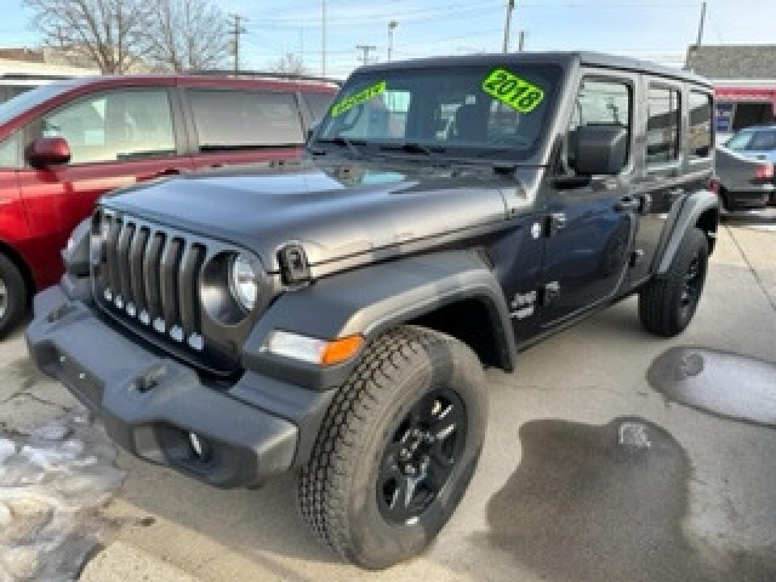 2018 SILVER Jeep Wrangler JK Unlimited Sport (1C4HJXDG8JW) with an 3.6L V6 DOHC 24V FFV engine, 6A transmission, located at 3200 1st Avenue North, Billings, MT, 59101, (406) 245-9055, 45.779270, -108.510742 - Super Sharp Jeep Unlimited Sport 4 door Hardtop! Automatic, 6 Cylinder Engine, Air Conditioning, Sport Package, Rear Mounted Spare Tire, Tow Package, One Owner and Much More! CarFax Dealer. Auto Brokers of Montana/AA&A Auto Rental/Fox Car Rental Billings - Photo #2
