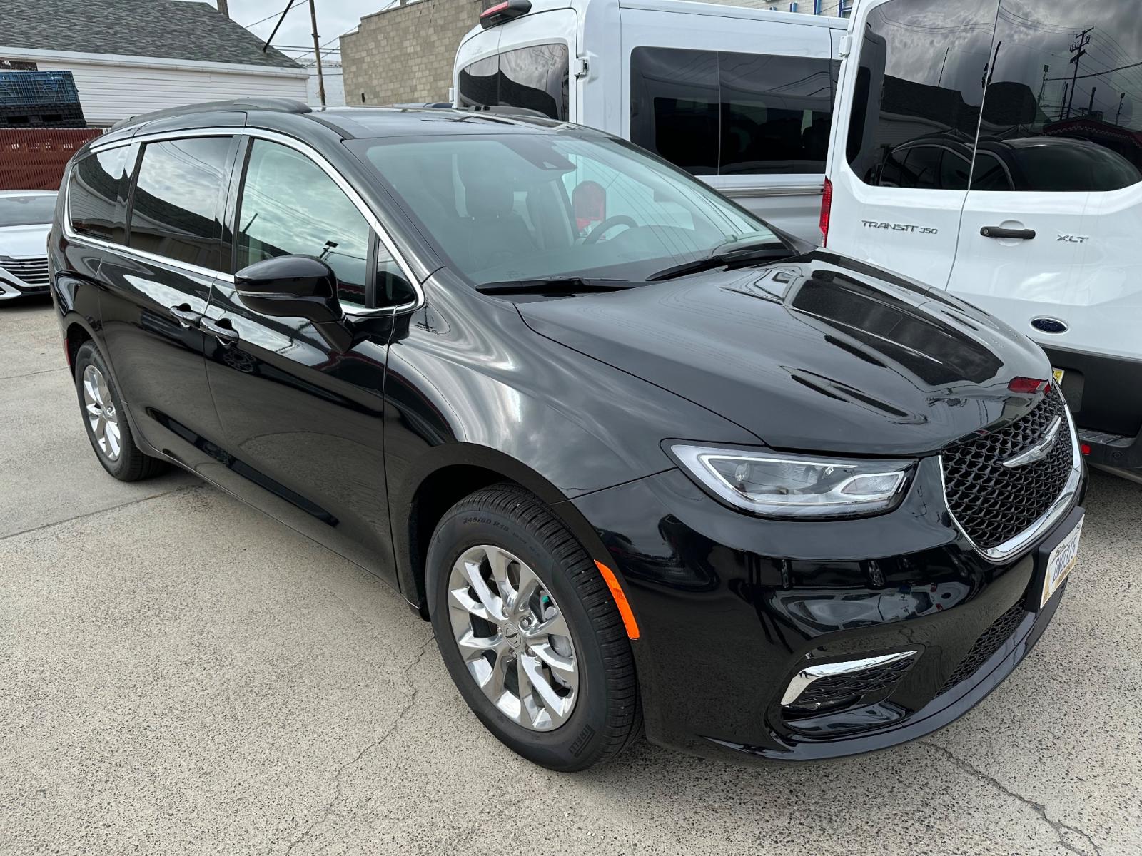 2022 Black Chrysler Pacifica Touring L AWD (2C4RC3BG5NR) with an 3.6L V6 DOHC 24V engine, 9A transmission, located at 3200 1st Avenue North, Billings, MT, 59101, (406) 245-9055, 45.779270, -108.510742 - This is One of Our Luxury Vehicles Available for Rent. Leather, Stow-N-Go Quad Seating, Power Sliding Doors, Power Heated Seats and All Wheel Drive. Auto Brokers of Montana/AA&A Auto Rental/Fox Car Rental Billings - Photo #1