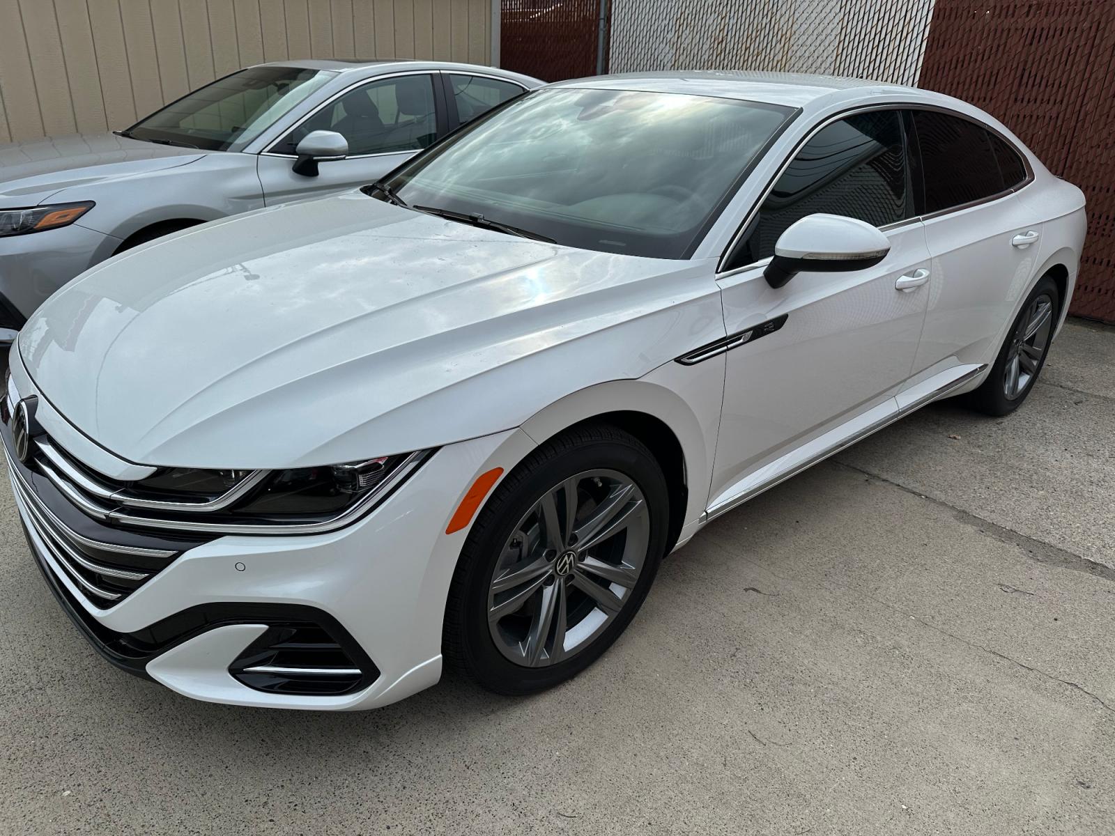 2023 White Volkswagen Arteon SEL R-Line 4MOTION (WVWSR7AN6PE) with an 2.0L L4 16V DOHC engine, 8A transmission, located at 3200 1st Avenue North, Billings, MT, 59101, (406) 245-9055, 45.779270, -108.510742 - Luxury Premium All Wheel Drive Sedan Available for Rent. Leather Interior, Power Moonroof, Power Heated & Cooled Seats With All the Whistles and Bells. Auto Brokers of Montana/AA&A Auto Rental/Fox Car Rental Billings - Photo #0