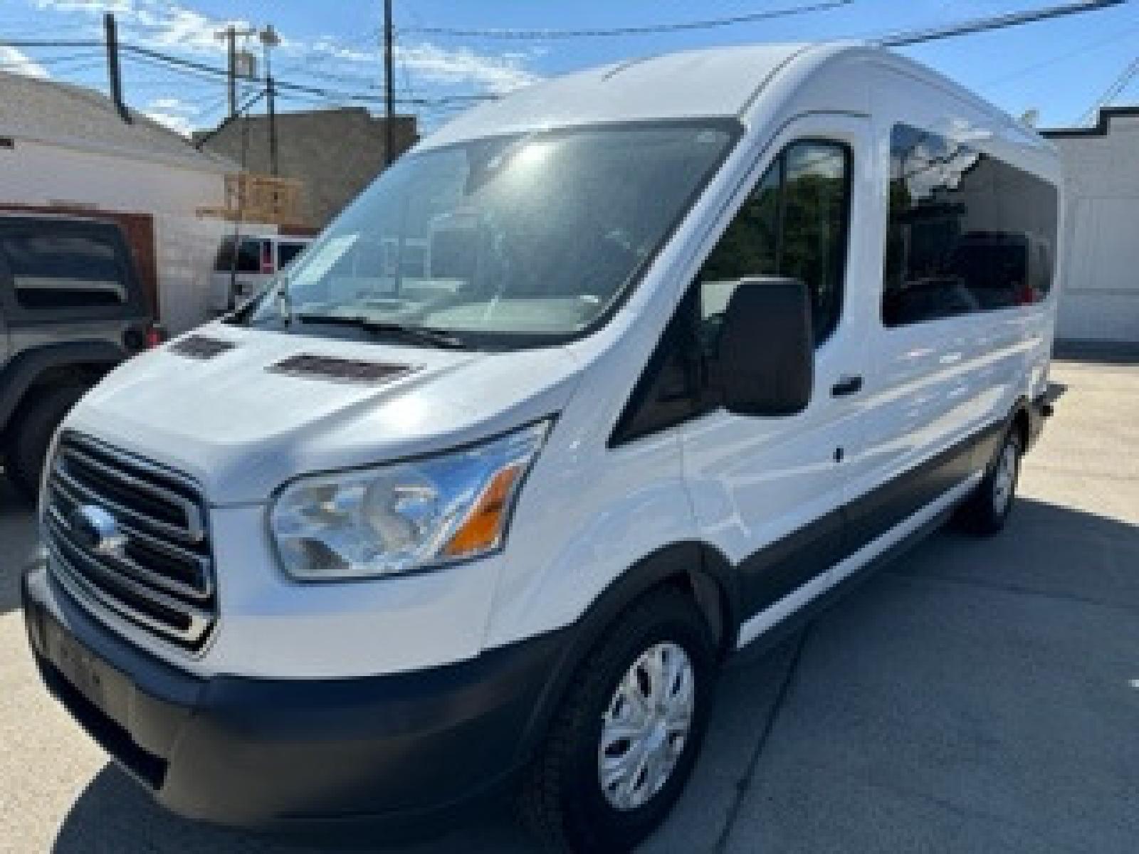 2015 White /GRAY Ford Transit 350 Wagon MID Roof XLT 60/40 Pass. 148-in. WB (1FBAX2CG3FK) with an 3.5L V6 DOHC 24V engine, 6-Speed Automatic transmission, located at 3200 1st Avenue North, Billings, MT, 59101, (406) 245-9055, 45.779270, -108.510742 - 15 Passenger, Medium Roof Ford Van. Power Windows, Power Door Locks, Tilt Steering Column, Cruise Control, Rear Air and Heat Controls, Towing and Much More! Only 75,000 Miles, CarFax Dealer. Auto Brokers of Montana/AA&A Auto Rental/Fox Car Rental Billings - Photo #0