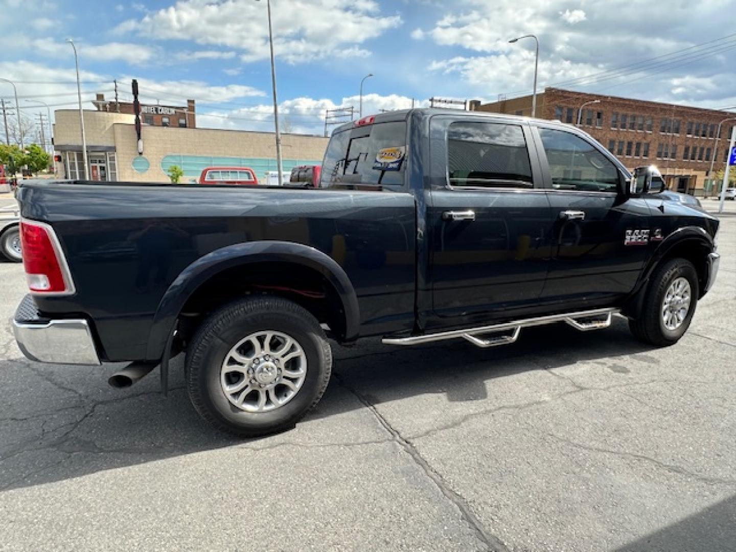 2015 Metallic /Charcoal leather RAM 3500 Laramie Crew Cab SWB 4WD (3C63R3EL6FG) with an 6.7L L6 OHV 24V TURBO DIESEL engine, 6-Speed Automatic transmission, located at 3200 1st Avenue North, Billings, MT, 59101, (406) 245-9055, 45.779270, -108.510742 - Super Nice and Rare, 1 Owner 3500 Crew Cab 4X4 Truck with All the Whistles and Bells! Cummins Diesel, Laramie Package, Power Moon Roof, Dual Power Seats, Bed Liner, Tow Package, Full Leather Interior, Automatic Transmission, Power Windows, Power Door Locks, Full Floor Mats, Dual Air Suspension for - Photo#5