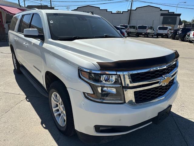 2015 Pearl White /Buckskin Chevrolet Suburban LT 1500 4WD (1GNSKJKC5FR) with an 5.3L V8 OHV 16V engine, 6-Speed Automatic transmission, located at 3200 1st Avenue North, Billings, MT, 59101, (406) 245-9055, 45.779270, -108.510742 - Very Nice Montana Trade-In. LT Package with Dual Power Leather Seats, Quad Seating, Power Moonroof, Power Lift Gate, Remote Start, Running Boards, 4X4, Lot of Miles but Well Taken Care Of and Way Less than Book Value! CarFax Dealer. Auto Brokers of Montana/AA&A Auto Rental/Fox Car Rental Billings - Photo#2