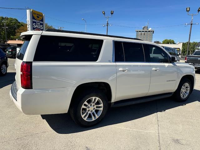 2015 Pearl White /Buckskin Chevrolet Suburban LT 1500 4WD (1GNSKJKC5FR) with an 5.3L V8 OHV 16V engine, 6-Speed Automatic transmission, located at 3200 1st Avenue North, Billings, MT, 59101, (406) 245-9055, 45.779270, -108.510742 - Very Nice Montana Trade-In. LT Package with Dual Power Leather Seats, Quad Seating, Power Moonroof, Power Lift Gate, Remote Start, Running Boards, 4X4, Lot of Miles but Well Taken Care Of and Way Less than Book Value! CarFax Dealer. Auto Brokers of Montana/AA&A Auto Rental/Fox Car Rental Billings - Photo#4