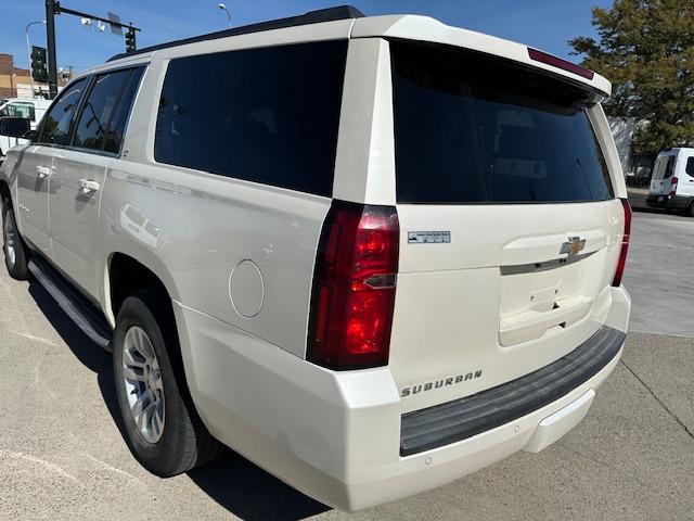 2015 Pearl White /Buckskin Chevrolet Suburban LT 1500 4WD (1GNSKJKC5FR) with an 5.3L V8 OHV 16V engine, 6-Speed Automatic transmission, located at 3200 1st Avenue North, Billings, MT, 59101, (406) 245-9055, 45.779270, -108.510742 - Very Nice Montana Trade-In. LT Package with Dual Power Leather Seats, Quad Seating, Power Moonroof, Power Lift Gate, Remote Start, Running Boards, 4X4, Lot of Miles but Well Taken Care Of and Way Less than Book Value! CarFax Dealer. Auto Brokers of Montana/AA&A Auto Rental/Fox Car Rental Billings - Photo#7