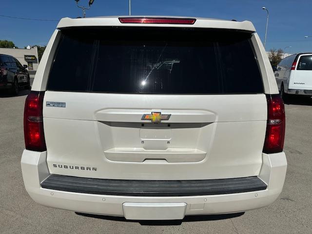 2015 Pearl White /Buckskin Chevrolet Suburban LT 1500 4WD (1GNSKJKC5FR) with an 5.3L V8 OHV 16V engine, 6-Speed Automatic transmission, located at 3200 1st Avenue North, Billings, MT, 59101, (406) 245-9055, 45.779270, -108.510742 - Very Nice Montana Trade-In. LT Package with Dual Power Leather Seats, Quad Seating, Power Moonroof, Power Lift Gate, Remote Start, Running Boards, 4X4, Lot of Miles but Well Taken Care Of and Way Less than Book Value! CarFax Dealer. Auto Brokers of Montana/AA&A Auto Rental/Fox Car Rental Billings - Photo#6