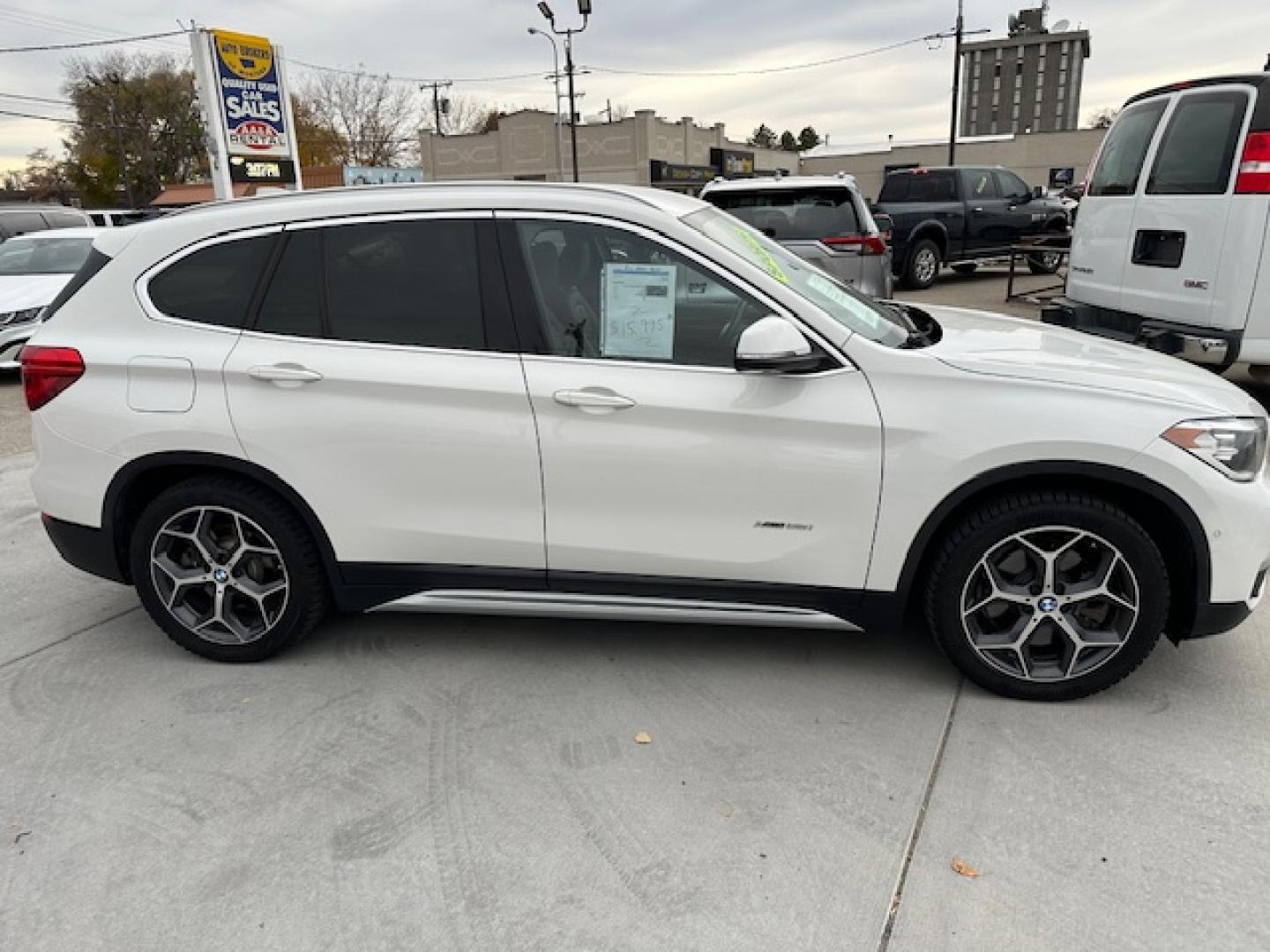 2016 White /Charcoal BMW X1 xDrive28i (WBXHT3C39GP) with an 2.0L L4 DOHC 16V engine, 8A transmission, located at 3200 1st Avenue North, Billings, MT, 59101, (406) 245-9055, 45.779270, -108.510742 - Super Nice Local All Wheel Drive Trade-In! Low Mileage, Power Seats, Leather Interior, Alloy Wheels, Great Tires, Automatic Transmission, Power Windows, Power Door Locks, Luxury and Only 84,000 Miles:) CarFax Dealer. Auto Brokers of Montana/AA&A Auto Rental/Fox Car Rental Billings - Photo#2