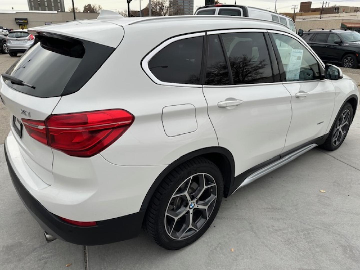 2016 White /Charcoal BMW X1 xDrive28i (WBXHT3C39GP) with an 2.0L L4 DOHC 16V engine, 8A transmission, located at 3200 1st Avenue North, Billings, MT, 59101, (406) 245-9055, 45.779270, -108.510742 - Super Nice Local All Wheel Drive Trade-In! Low Mileage, Power Seats, Leather Interior, Alloy Wheels, Great Tires, Automatic Transmission, Power Windows, Power Door Locks, Luxury and Only 84,000 Miles:) CarFax Dealer. Auto Brokers of Montana/AA&A Auto Rental/Fox Car Rental Billings - Photo#3