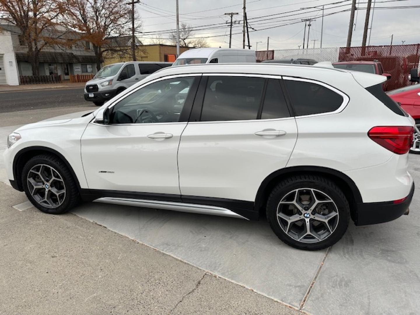 2016 White /Charcoal BMW X1 xDrive28i (WBXHT3C39GP) with an 2.0L L4 DOHC 16V engine, 8A transmission, located at 3200 1st Avenue North, Billings, MT, 59101, (406) 245-9055, 45.779270, -108.510742 - Super Nice Local All Wheel Drive Trade-In! Low Mileage, Power Seats, Leather Interior, Alloy Wheels, Great Tires, Automatic Transmission, Power Windows, Power Door Locks, Luxury and Only 84,000 Miles:) CarFax Dealer. Auto Brokers of Montana/AA&A Auto Rental/Fox Car Rental Billings - Photo#6