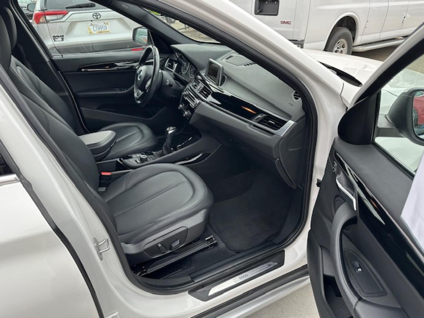 2016 White /Charcoal BMW X1 xDrive28i (WBXHT3C39GP) with an 2.0L L4 DOHC 16V engine, 8A transmission, located at 3200 1st Avenue North, Billings, MT, 59101, (406) 245-9055, 45.779270, -108.510742 - Super Nice Local All Wheel Drive Trade-In! Low Mileage, Power Seats, Leather Interior, Alloy Wheels, Great Tires, Automatic Transmission, Power Windows, Power Door Locks, Luxury and Only 84,000 Miles:) CarFax Dealer. Auto Brokers of Montana/AA&A Auto Rental/Fox Car Rental Billings - Photo#14