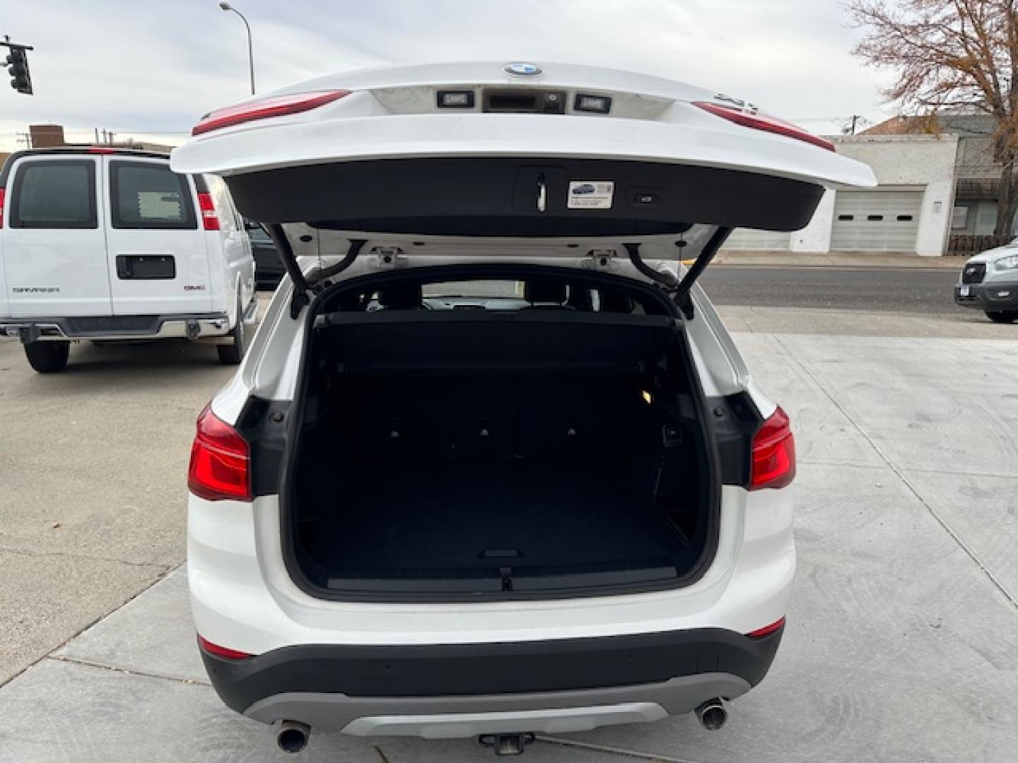 2016 White /Charcoal BMW X1 xDrive28i (WBXHT3C39GP) with an 2.0L L4 DOHC 16V engine, 8A transmission, located at 3200 1st Avenue North, Billings, MT, 59101, (406) 245-9055, 45.779270, -108.510742 - Super Nice Local All Wheel Drive Trade-In! Low Mileage, Power Seats, Leather Interior, Alloy Wheels, Great Tires, Automatic Transmission, Power Windows, Power Door Locks, Luxury and Only 84,000 Miles:) CarFax Dealer. Auto Brokers of Montana/AA&A Auto Rental/Fox Car Rental Billings - Photo#12