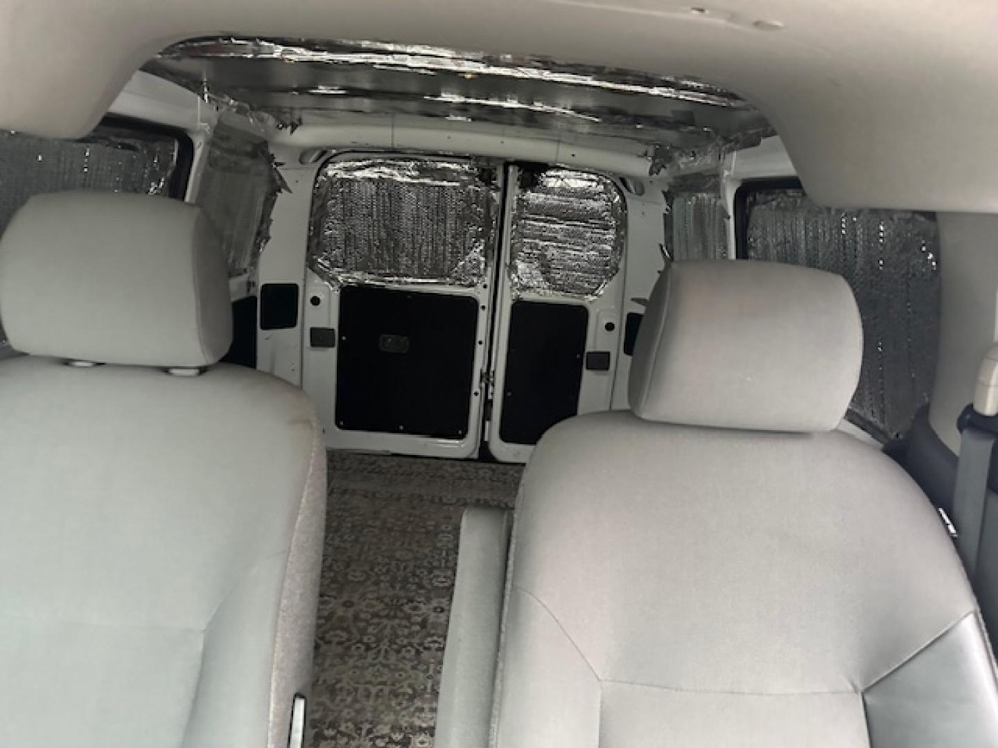 2018 White /Gray Nissan NV200 S (3N6CM0KN0JK) with an 2.0L L4 DOHC 16V engine, CVT transmission, located at 3200 1st Avenue North, Billings, MT, 59101, (406) 245-9055, 45.779270, -108.510742 - Very Low Mileage, 250 Cargo Van. One Owner, Automatic Transmission, Front Wheel Drive, Power Windows, Power Door Locks, Air Conditioning and Only 51,000 Miles. CarFax Dealer. Auto Brokers of Montana/AA&A Auto Rental/Fox Car Rental Billings- Photo#9