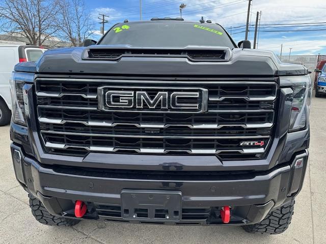 2024 Titanium Rush Metallic /Tu-Tone Leather GMC Sierra 2500HD AT4 Crew Cab 4WD (1GT49PEY3RF) with an 6.6L V8 OHV 16V TURBO DIESEL engine, 6A transmission, located at 3200 1st Avenue North, Billings, MT, 59101, (406) 245-9055, 45.779270, -108.510742 - A Gorgeous Truck with All the Options Including a Lift for Extra Clearance! Full LEather Interior with the Kalahari Accents, 6.6 DuraMax Diesel Power, Allison 10 Speed Automatic Transmission, Power Running Boards, Power Windows, Power Door Locks, Power Moon-Roof, Soft Tonneau Cover, Tow Package, Pa - Photo#1