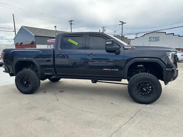 2024 Titanium Rush Metallic /Tu-Tone Leather GMC Sierra 2500HD AT4 Crew Cab 4WD (1GT49PEY3RF) with an 6.6L V8 OHV 16V TURBO DIESEL engine, 6A transmission, located at 3200 1st Avenue North, Billings, MT, 59101, (406) 245-9055, 45.779270, -108.510742 - A Gorgeous Truck with All the Options Including a Lift for Extra Clearance! Full LEather Interior with the Kalahari Accents, 6.6 DuraMax Diesel Power, Allison 10 Speed Automatic Transmission, Power Running Boards, Power Windows, Power Door Locks, Power Moon-Roof, Soft Tonneau Cover, Tow Package, Pa - Photo#3
