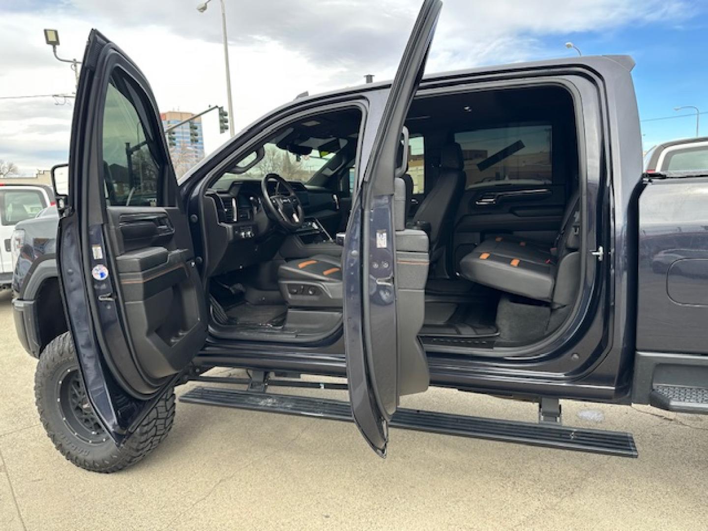 2024 Titanium Rush Metallic /Tu-Tone Leather GMC Sierra 2500HD AT4 Crew Cab 4WD (1GT49PEY3RF) with an 6.6L V8 OHV 16V TURBO DIESEL engine, 6A transmission, located at 3200 1st Avenue North, Billings, MT, 59101, (406) 245-9055, 45.779270, -108.510742 - A Gorgeous Truck with All the Options Including a Lift for Extra Clearance! Full LEather Interior with the Kalahari Accents, 6.6 DuraMax Diesel Power, Allison 10 Speed Automatic Transmission, Power Running Boards, Power Windows, Power Door Locks, Power Moon-Roof, Soft Tonneau Cover, Tow Package, Pa - Photo#15