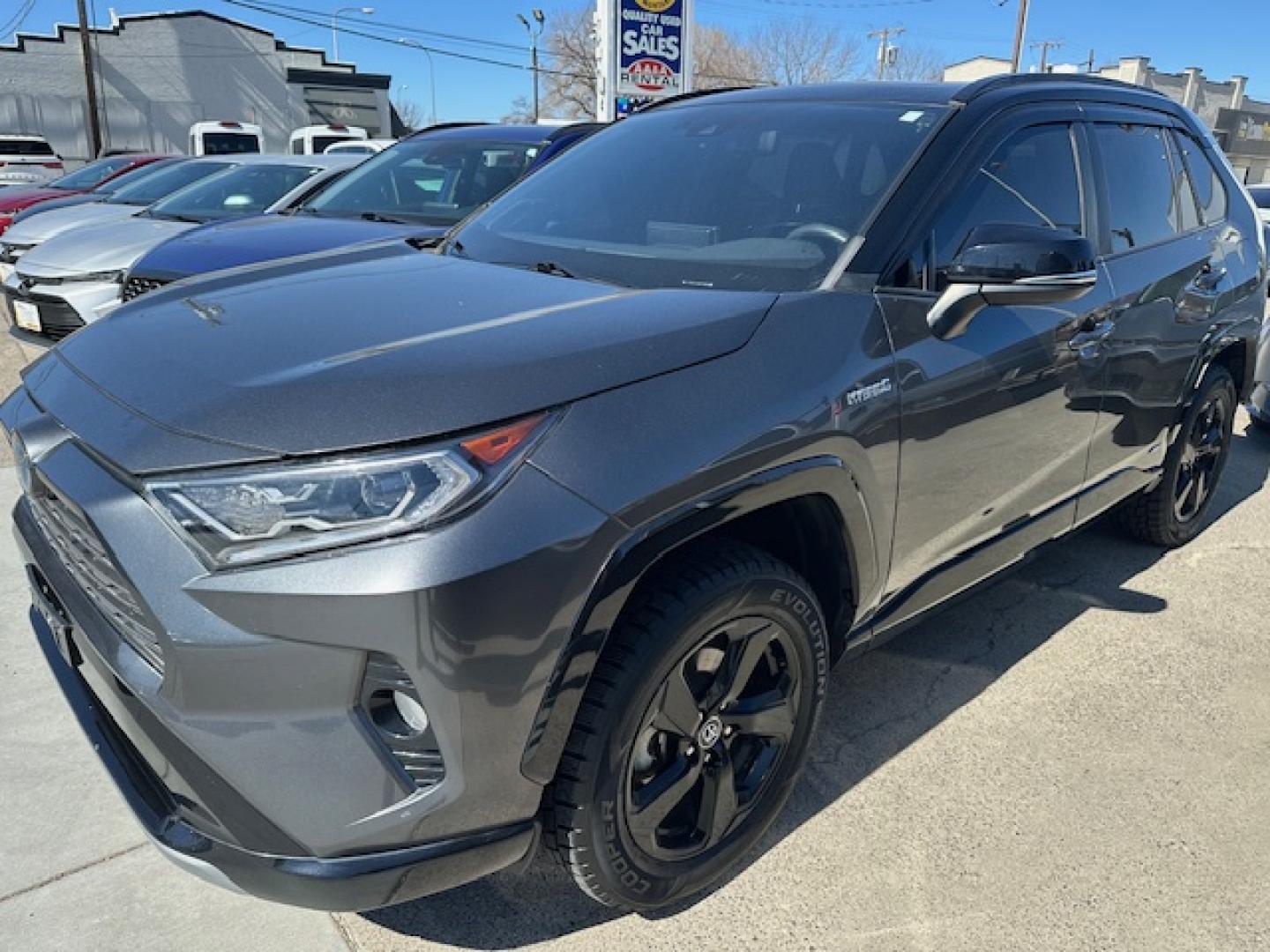 2021 Charcoal /Charcoal Gray Leather w/ Blue Highlights Toyota RAV4 Hybrid XSE (4T3E6RFV2MU) with an 2.5L L4 DOHC 16V HYBRID engine, CVT transmission, located at 3200 1st Avenue North, Billings, MT, 59101, (406) 245-9055, 45.779270, -108.510742 - Super Hard to Find Loaded Up Toyota Rav4 with Low Mileage. All Wheel Drive, Top of the Line XSE Model, Hybrid Powertrain, Power Seat, Power Moon Roof, Power Rear Hatch, Tu-Tone Exterior Trim Package Including Wheels, Power Windows, Power Door Locks, Navigation, Adaptive Cruise Control, Air Condition - Photo#0