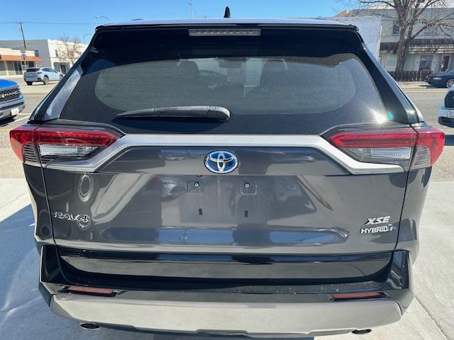 2021 Charcoal /Charcoal Gray Leather w/ Blue Highlights Toyota RAV4 Hybrid XSE (4T3E6RFV2MU) with an 2.5L L4 DOHC 16V HYBRID engine, CVT transmission, located at 3200 1st Avenue North, Billings, MT, 59101, (406) 245-9055, 45.779270, -108.510742 - Super Hard to Find Loaded Up Toyota Rav4 with Low Mileage. All Wheel Drive, Top of the Line XSE Model, Hybrid Powertrain, Power Seat, Power Moon Roof, Power Rear Hatch, Tu-Tone Exterior Trim Package Including Wheels, Power Windows, Power Door Locks, Navigation, Adaptive Cruise Control, Air Condition - Photo#5