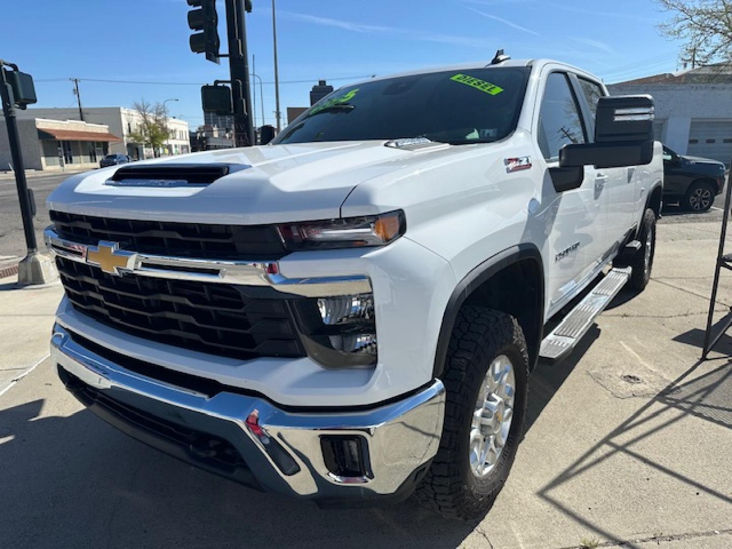 2025 White /Charcoal Chevrolet Silverado 2500HD LT Crew Cab Short Box 4WD (1GC1KNEY5SF) with an 6.6L V8 OHV 16V DIESEL engine, 6A transmission, located at 3200 1st Avenue North, Billings, MT, 59101, (406) 245-9055, 45.779270, -108.510742 - Super Nice DuraMax Crew Cab 2500 HD 4x4. Bed Liner, Power Seats, Power Windows, 6 Person Seating, Running Boards, Tilt Steering, Power Tailgate, Towing, Z71 Package, Automatic Transmission, Alloy Wheels and More! CarFax Dealer. Auto Brokers of Montana/AA&A Auto Rental/Fox Car Rental Billings- Photo#0
