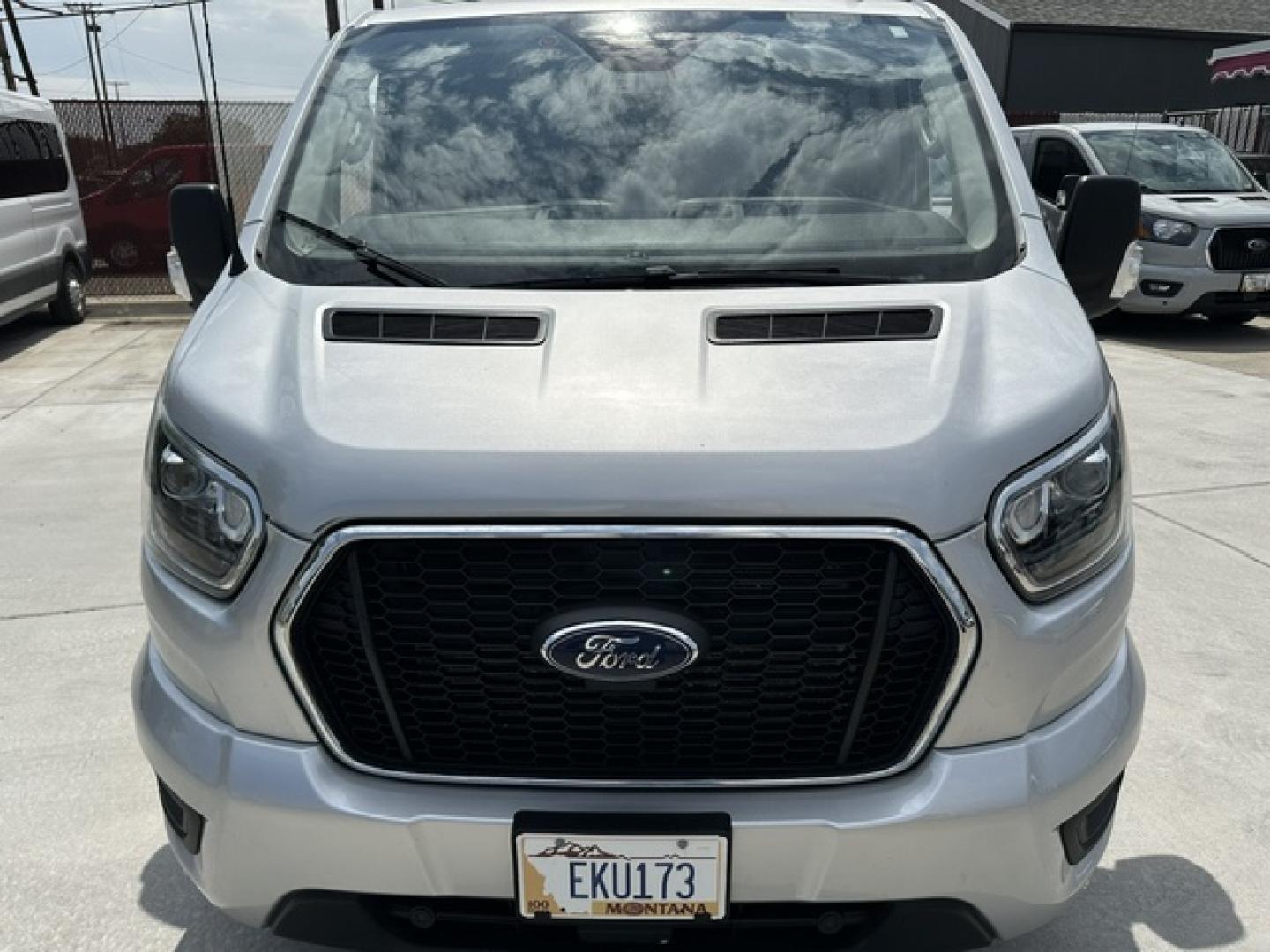 2023 SILVER /Gray Ford Transit 350 Wagon Low Roof XLT w/Sliding Pass. 148-in. WB (1FBAX9YG9PK) with an 3.5L V6 DOHC 24V engine, 6A transmission, located at 3200 1st Avenue North, Billings, MT, 59101, (406) 245-9055, 45.779270, -108.510742 - 1-Owner Off-Leased Passenger Van with Low Mileage. XLT Package, All Wheel Drive, Dual Overhead Cam Eco-Boost Engine, Privacy Glass, Cloth Interior, Front and Rear Heat and Air Conditioning, Extended 12 Passenger Seating and Regular Service Intervals. CarFax Dealer. Auto Brokers of Montana/AA&A Au- Photo#1