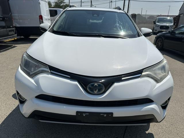 2017 White /Gray Cloth Toyota RAV4 Hybrid XLE (JTMRJREV1HD) with an 2.5L L4 DOHC 16V HYBRID engine, CVT transmission, located at 3200 1st Avenue North, Billings, MT, 59101, (406) 245-9055, 45.779270, -108.510742 - Fuel Saver SUV! Very Low Mileage, Hybrid Power Train, Automatic Transmission, Tilt Steering Column, Cruise Control, Power Moon Roof, Power Windows, Power Door Locks, XLE Package and Only 46,300 Miles! CarFax Dealer Auto Brokers of Montana/AA&A Auto Rental/Fox Car Rental Billings- Photo#1