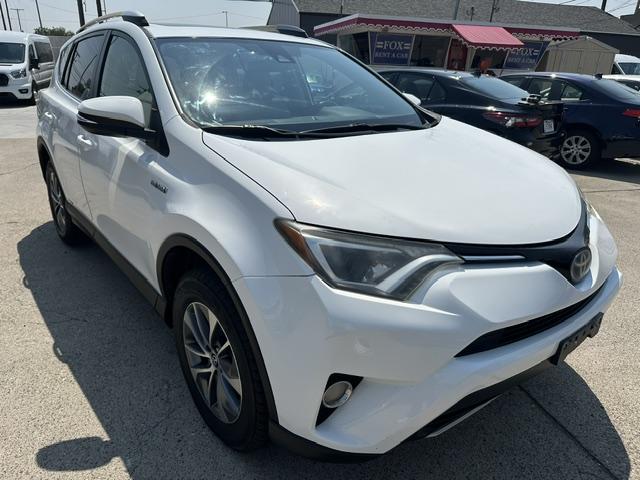2017 White /Gray Cloth Toyota RAV4 Hybrid XLE (JTMRJREV1HD) with an 2.5L L4 DOHC 16V HYBRID engine, CVT transmission, located at 3200 1st Avenue North, Billings, MT, 59101, (406) 245-9055, 45.779270, -108.510742 - Fuel Saver SUV! Very Low Mileage, Hybrid Power Train, Automatic Transmission, Tilt Steering Column, Cruise Control, Power Moon Roof, Power Windows, Power Door Locks, XLE Package and Only 46,300 Miles! CarFax Dealer Auto Brokers of Montana/AA&A Auto Rental/Fox Car Rental Billings- Photo#2