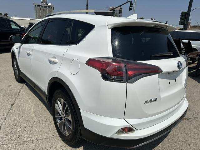 2017 White /Gray Cloth Toyota RAV4 Hybrid XLE (JTMRJREV1HD) with an 2.5L L4 DOHC 16V HYBRID engine, CVT transmission, located at 3200 1st Avenue North, Billings, MT, 59101, (406) 245-9055, 45.779270, -108.510742 - Fuel Saver SUV! Very Low Mileage, Hybrid Power Train, Automatic Transmission, Tilt Steering Column, Cruise Control, Power Moon Roof, Power Windows, Power Door Locks, XLE Package and Only 46,300 Miles! CarFax Dealer Auto Brokers of Montana/AA&A Auto Rental/Fox Car Rental Billings- Photo#6